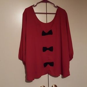 Gorgoues red top with black bows down back